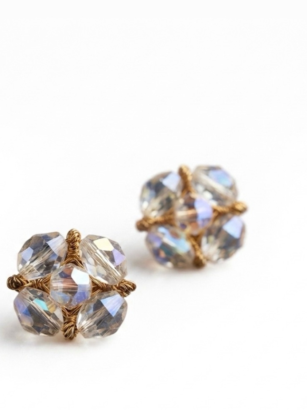 Vintage Aurora Borealis (AB) faceted crystal cluster clip-on earrings.